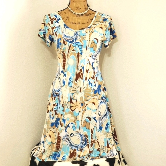 Classic Woman Dresses & Skirts - NWOT Floral face graphics dress Lrg. SEE MEASUREMENTS for size